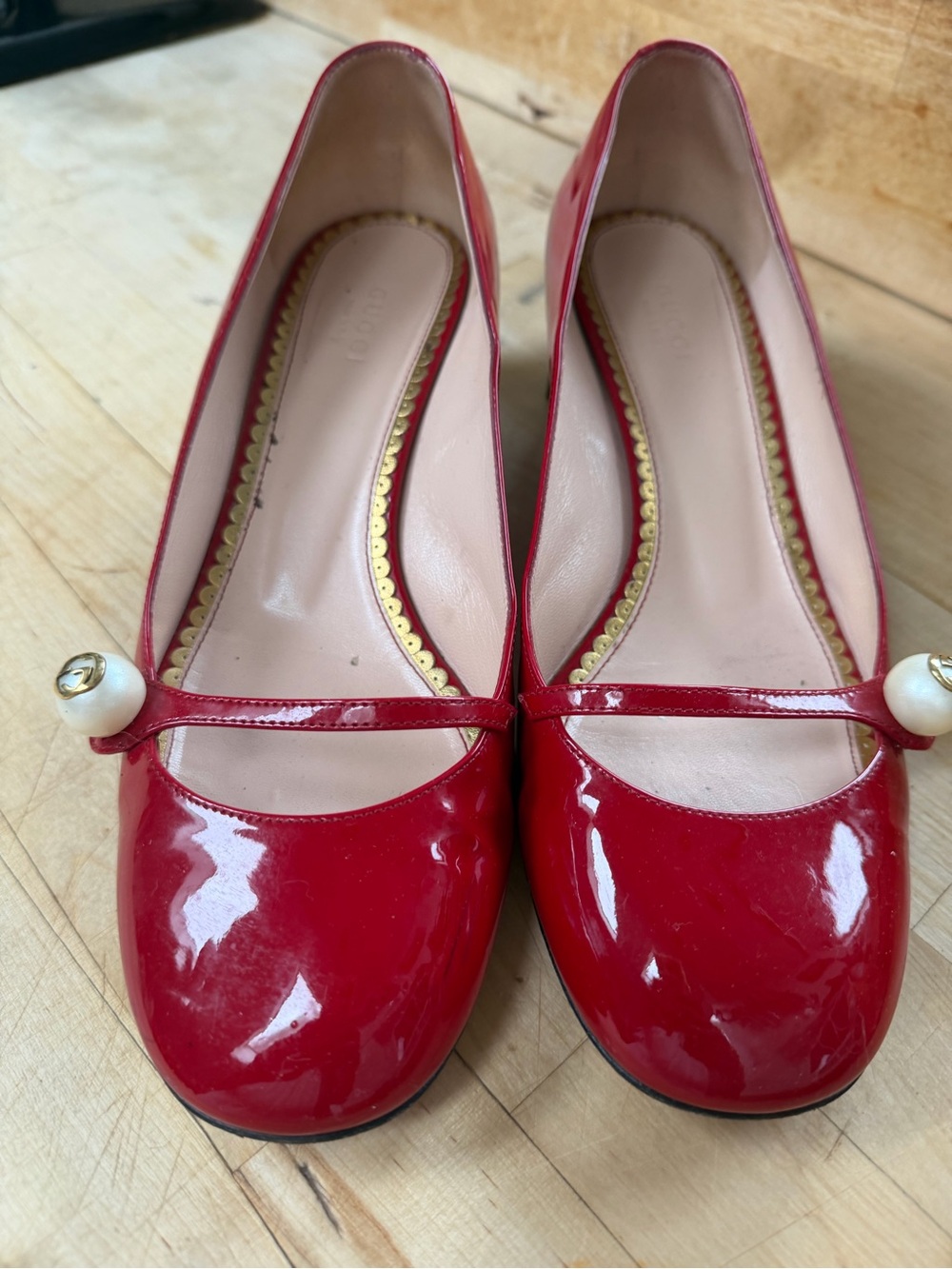 Gucci Red Patent Mary Jane "Arielle" Shoes with Pearl Detail and low Gold heel.